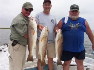 Tim,Dan, and Mike show off some nice Redfish